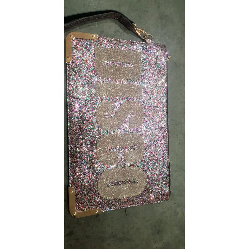 NWOT glitter clutch bag with DISCO motif