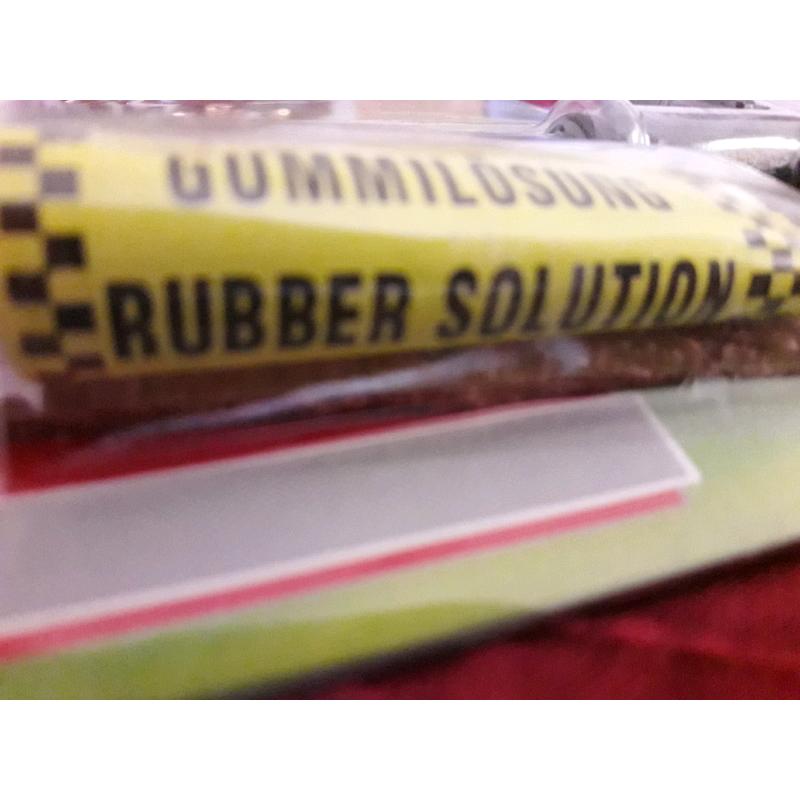 Rubber solution tire leak sealer