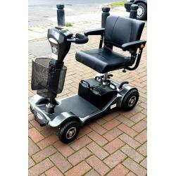 mobility scooter with 12 months warranty, free local delivery