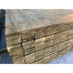 Timber lengths rough sawn pressure treated green