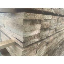 Timber lengths rough sawn pressure treated green