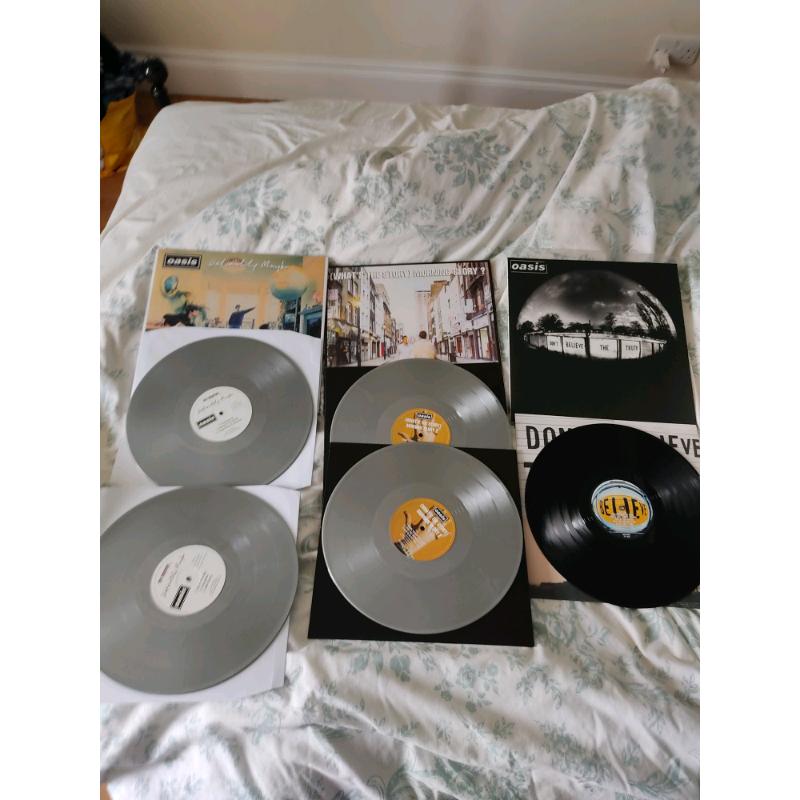 Three oasis albums