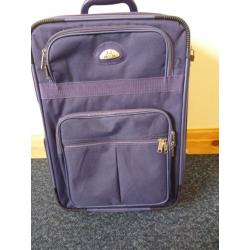 Wheel along Purple Suitcase Expandable Multiple pockets Carry on size